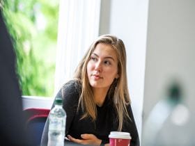 An image of a student on a General English course in Cambridge, linking to a page on the CE-28 course.