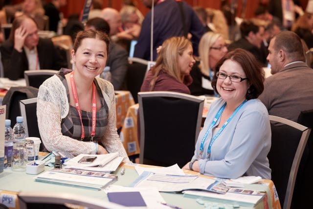 Nicole Kennedy, Sales Director of Studio Cambridge Language School, sits with on of our agents at ICEF conference in Berlin.